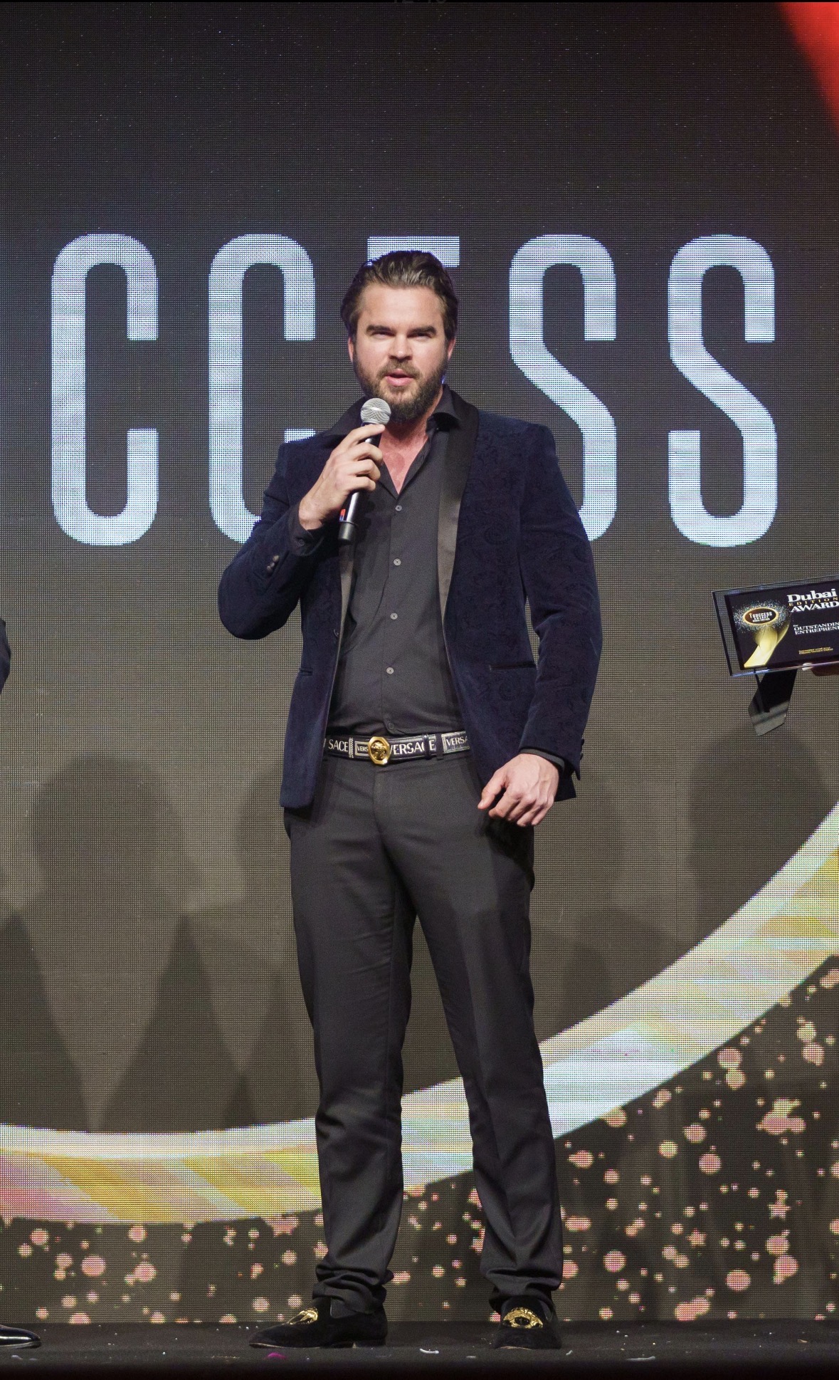 James Warwick receiving the Dubai Outstanding Entrepreneur Award 2024